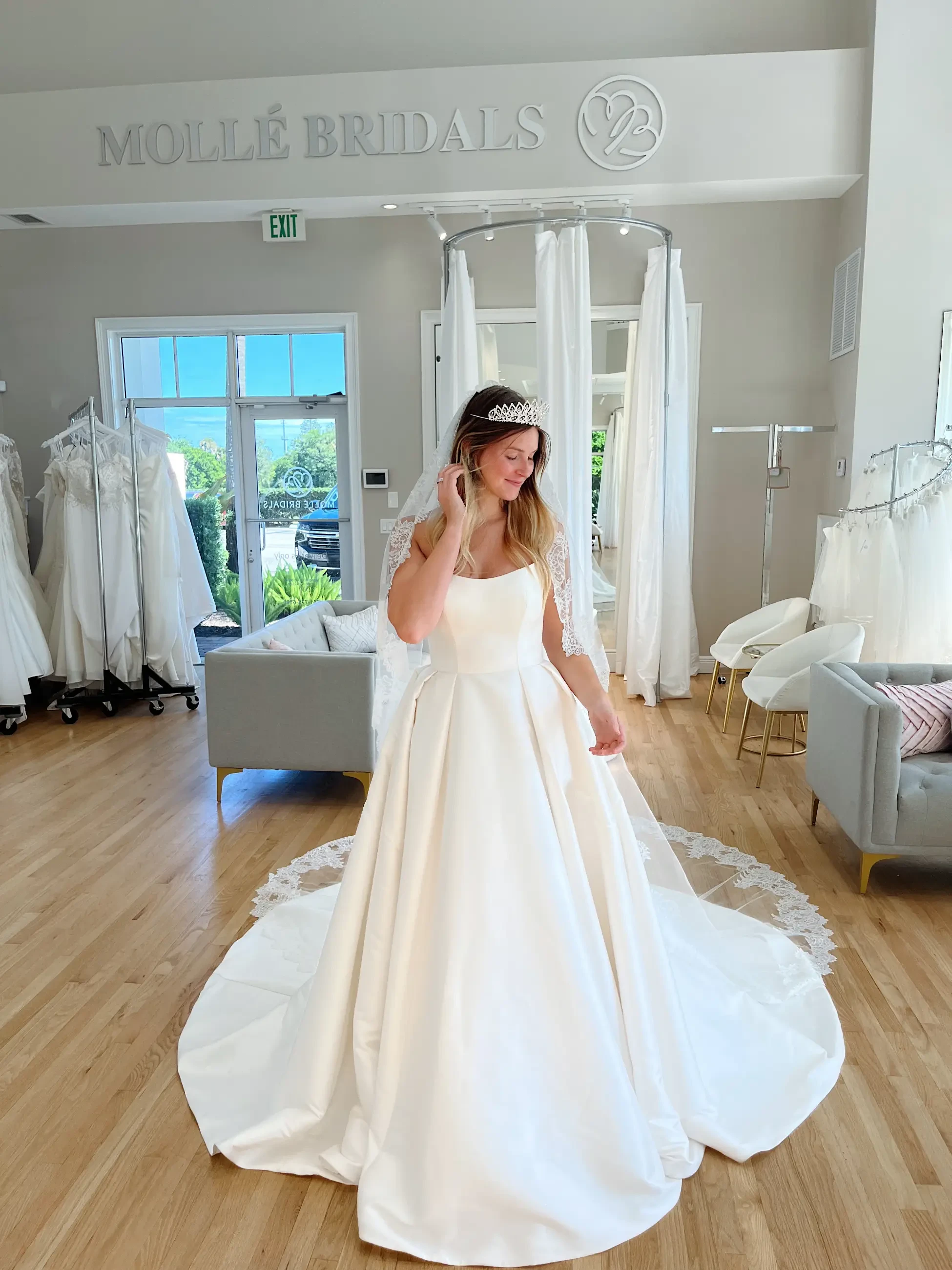 model is wearing a ball gown wedding dress